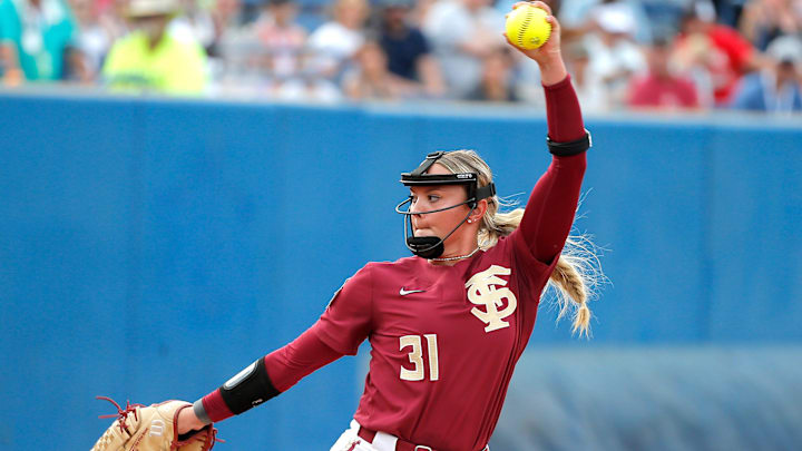 Florida State's Makenna Reid (31) throws a pitch during a softball game between Washington and