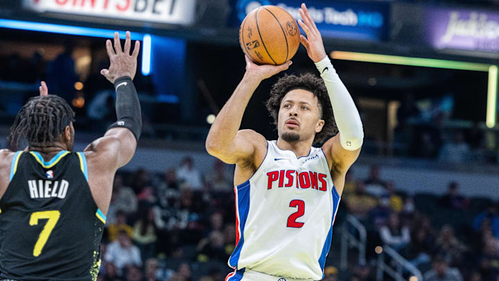 Nov 24, 2023; Indianapolis, Indiana, USA; Detroit Pistons guard Cade Cunningham (2) shoots the ball while Indiana Pacers guard Buddy Hield (7) defends in the first half at Gainbridge Fieldhouse. Mandatory Credit: Trevor Ruszkowski-Imagn Images Nov 24, 2023; Indianapolis, Indiana, USA; Detroit Pistons guard Cade Cunningham (2) shoots the ball while Indiana Pacers guard Buddy Hield (7) defends in the first half at Gainbridge Fieldhouse. Mandatory Credit: Trevor Ruszkowski-Imagn Images