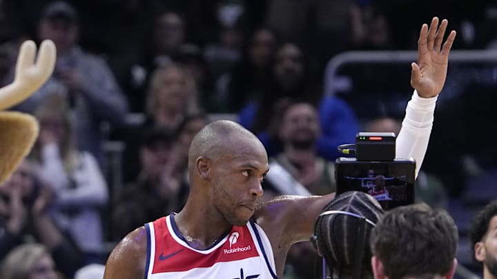 Oct 22, 2025; Milwaukee, Wisconsin, USA; Washington Wizards forward Khris Middleton 22) waves to the crowd after being acknowledged by the public address announcer during a time out during their game at Fiserv Forum. It was Washington Wizards forward Khris Middleton (22) first return after being traded laster year. Mandatory Credit: Michael McLoone-Imagn Images Oct 22, 2025; Milwaukee, Wisconsin, USA; Washington Wizards forward Khris Middleton 22) waves to the crowd after being acknowledged by the public address announcer during a time out during their game at Fiserv Forum. It was Washington Wizards forward Khris Middleton (22) first return after being traded laster year. Mandatory Credit: Michael McLoone-Imagn Images