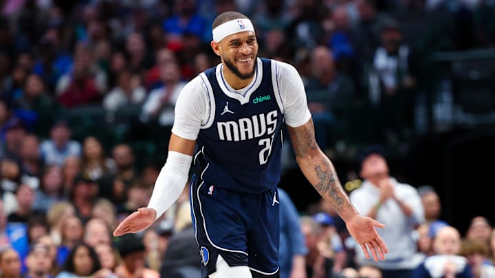 Feb 10, 2024; Dallas, Texas, USA; Dallas Mavericks center Daniel Gafford (21) reacts during the