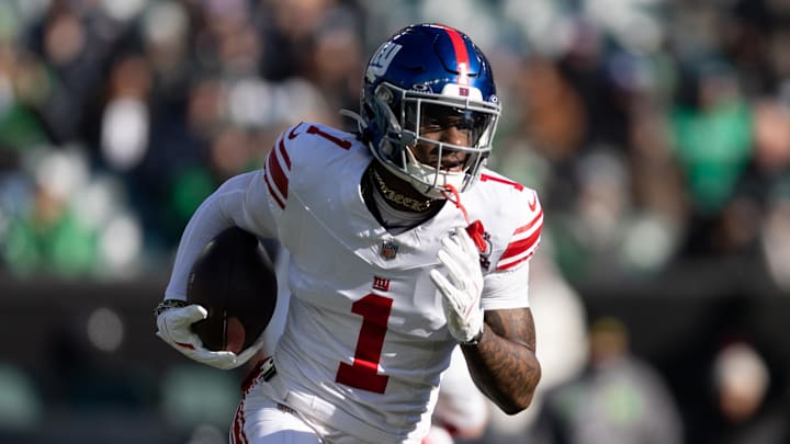 New York Giants wide receiver Malik Nabers (1) runs with the ball against the Philadelphia Eagles during the first quarter at Lincoln Financial Field. 