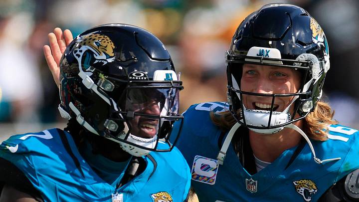 (EDITORÕS NOTE: Resubmitted with alternate crop.) Jacksonville Jaguars quarterback Trevor Lawrence (16) congratulates wide receiver Brian Thomas Jr. (7) on his touchdown score during the third quarter of an NFL football matchup Sunday, Oct. 27, 2024 at EverBank Stadium in Jacksonville, Fla. The Packers edged the Jaguars 30-27 on a last-second field goal. [Corey Perrine/Florida Times-Union]