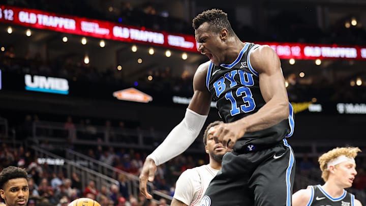 Mar 14, 2025; Kansas City, MO, USA; Brigham Young Cougars center Keba Keita (13) reacts after a dunk during the second half against the Houston Cougars at T-Mobile Center. Mandatory Credit: William Purnell-Imagn Images Mar 14, 2025; Kansas City, MO, USA; Brigham Young Cougars center Keba Keita (13) reacts after a dunk during the second half against the Houston Cougars at T-Mobile Center. Mandatory Credit: William Purnell-Imagn Images