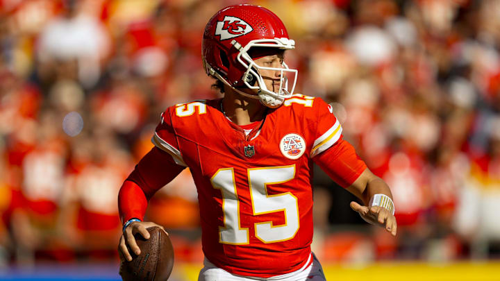 Nov 10, 2024; Kansas City, Missouri, USA; Kansas City Chiefs quarterback Patrick Mahomes (15) drops back to pass during the first half against the Denver Broncos at GEHA Field at Arrowhead Stadium. Mandatory Credit: Jay Biggerstaff-Imagn Images