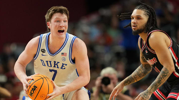 Apr 5, 2025; San Antonio, TX, USA; Duke Blue Devils guard Kon Knueppel (7) controls the ball against the Houston Cougars during the first half in the semifinals of the men's Final Four of the 2025 NCAA Tournament at the Alamodome. Mandatory Credit: Bob Donnan-Imagn Images