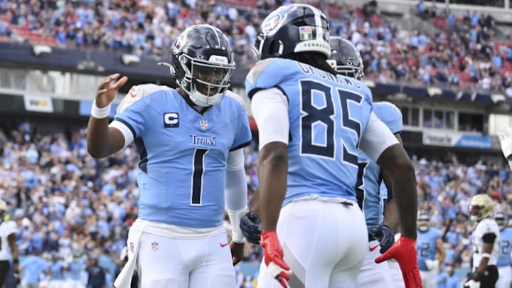 Tennessee Titans tight end Chig Okonkwo (85) celebrates scoring a touchdown against the with Tennessee Titans quarterback Cam Ward (1) Tennessee Titans tight end Chig Okonkwo (85) celebrates scoring a touchdown against the with Tennessee Titans quarterback Cam Ward (1)