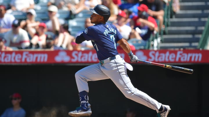 Seattle Mariners second baseman Jorge Polanco hits a single against the Los Angeles Angels on Sunday.