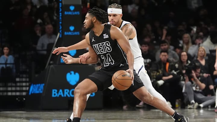 Oct 29, 2024; Brooklyn, New York, USA; Brooklyn Nets small guard Cam Thomas (24) dribbles the ball against Denver Nuggets small forward Michael Porter Jr. (1) during the first half at Barclays Center. Mandatory Credit: Gregory Fisher-Imagn Images Oct 29, 2024; Brooklyn, New York, USA; Brooklyn Nets small guard Cam Thomas (24) dribbles the ball against Denver Nuggets small forward Michael Porter Jr. (1) during the first half at Barclays Center. Mandatory Credit: Gregory Fisher-Imagn Images