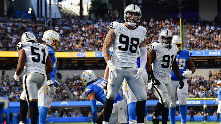 Oct 1, 2023; Inglewood, California, USA; Las Vegas Raiders defensive end Maxx Crosby (98) celebrates after sacking Los Angeles Chargers quarterback Justin Herbert (10) during the second half at SoFi Stadium. Mandatory Credit: Gary A. Vasquez-USA TODAY Sports