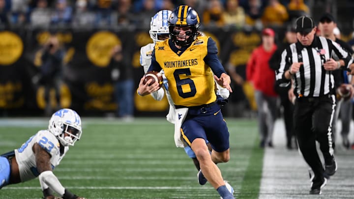 Dec 27, 2023; Charlotte, NC, USA; West Virginia Mountaineers quarterback Garrett Greene (6).