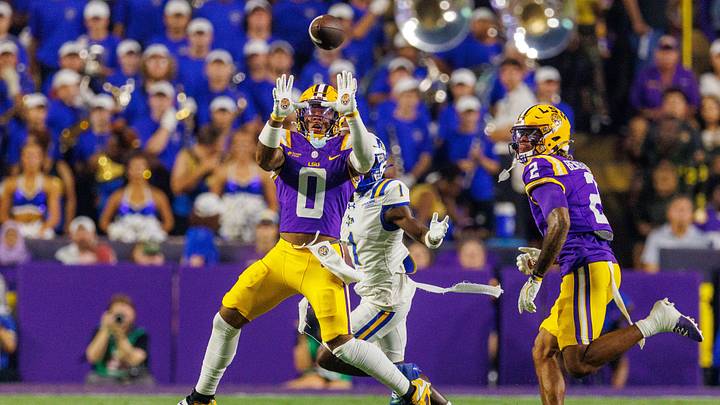Oct 3, 2026; Baton Rouge, Louisiana, USA; LSU Tigers safety Tamarcus Cooley (0) intercepts a pass from McNeese Cowboys quarterback Jake Strong (not pictured) during the first half at Tiger Stadium. Mandatory Credit: Stephen Lew-Imagn Images Oct 3, 2026; Baton Rouge, Louisiana, USA; LSU Tigers safety Tamarcus Cooley (0) intercepts a pass from McNeese Cowboys quarterback Jake Strong (not pictured) during the first half at Tiger Stadium. Mandatory Credit: Stephen Lew-Imagn Images