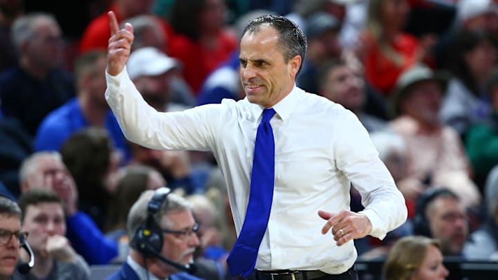 Mar 22, 2025; Wichita, KS, USA; Drake Bulldogs head coach Ben McCollum reacts after a play against the Texas Tech Red Raiders during the first half at Intrust Bank Arena. Mandatory Credit: Nick Tre. Smith-Imagn Images
