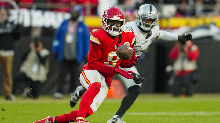 Nov 29, 2024; Kansas City, Missouri, USA; Kansas City Chiefs wide receiver DeAndre Hopkins (8) is unable to make a catch against Las Vegas Raiders safety Thomas Harper (34) during the second half at GEHA Field at Arrowhead Stadium. Mandatory Credit: Jay Biggerstaff-Imagn Images