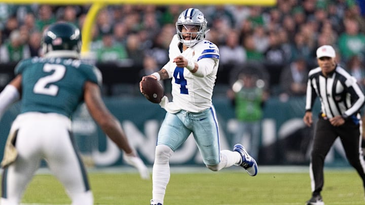 Dallas Cowboys quarterback Dak Prescott runs with the ball against the Philadelphia Eagles.