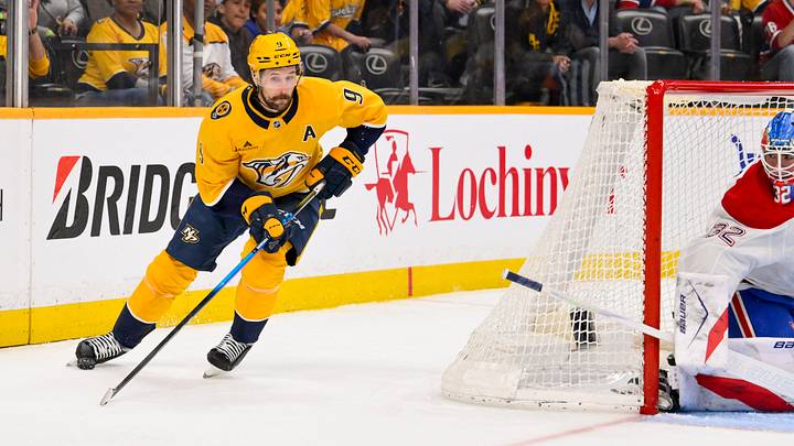 Mar 28, 2026; Nashville, Tennessee, USA;  Nashville Predators left wing Filip Forsberg (9) skates behind the net against the Montreal Canadiens during the first period Gat Bridgestone Arena. Mandatory Credit: Steve Roberts-Imagn Images