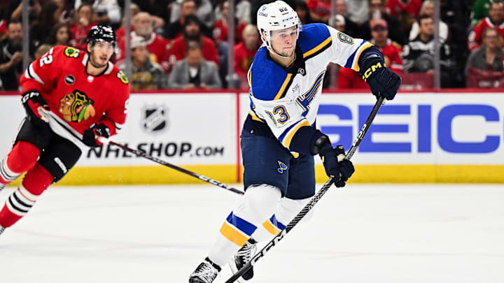 Sep 28, 2023; Chicago, Illinois, USA;  St. Louis Blues defenseman Hunter Skinner (83) skates against the Chicago Blackhawks at United Center. Mandatory Credit: Jamie Sabau-Imagn Images