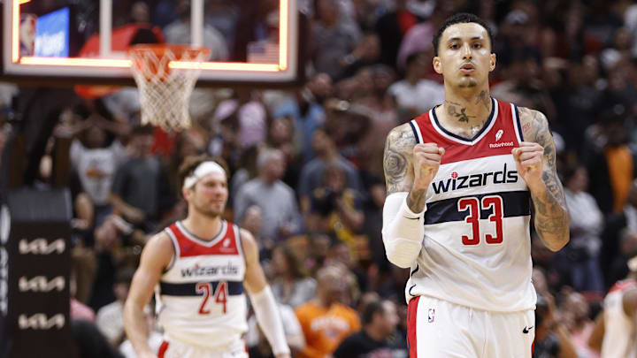 Mar 10, 2024; Miami, Florida, USA; Washington Wizards
forward Kyle Kuzma (33) and forward Corey Kispert (24) react after defeating the Miami Heat following the game at Kaseya Center. Mandatory Credit: Rhona Wise-Imagn Images