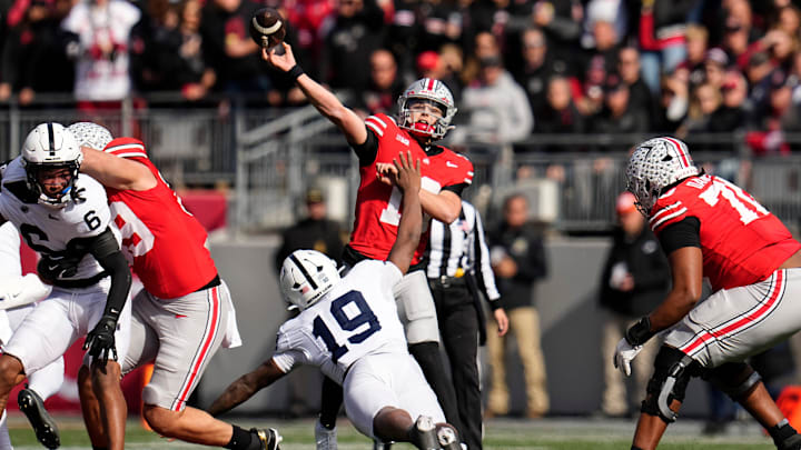 Ohio State Buckeyes quarterback Julian Sayin (10) throws a long touchdown pass to Carnell Tate against the Penn State Nittany Lions at Ohio Stadium.