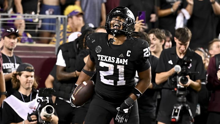 Texas A&M Aggies linebacker Taurean York reacts after catching an interception against the LSU Tigers.