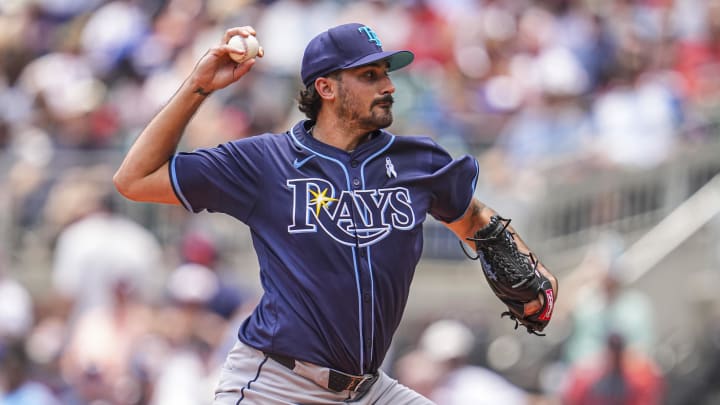 Jun 16, 2024; Cumberland, Georgia, USA; Tampa Bay Rays starting pitcher Zach Eflin (24) pitches against the Atlanta Braves at Truist Park. Mandatory Credit: Dale Zanine-USA TODAY Sports Jun 16, 2024; Cumberland, Georgia, USA; Tampa Bay Rays starting pitcher Zach Eflin (24) pitches against the Atlanta Braves at Truist Park. Mandatory Credit: Dale Zanine-USA TODAY Sports