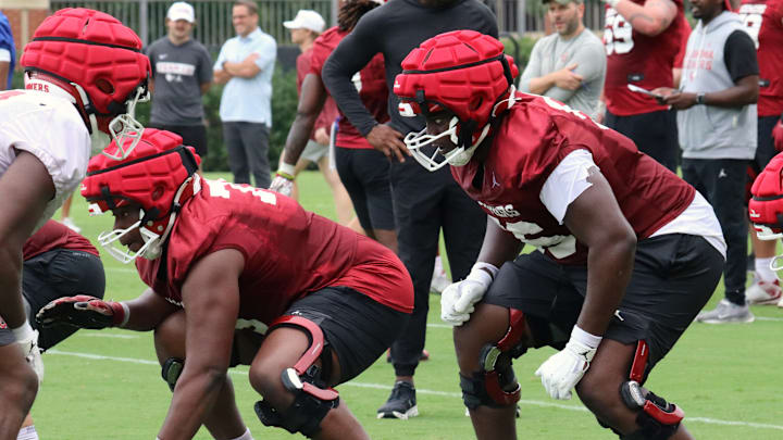 Oklahoma offensive linemen Michael Fasusi and Daniel Akinkunmi Oklahoma offensive linemen Michael Fasusi and Daniel Akinkunmi