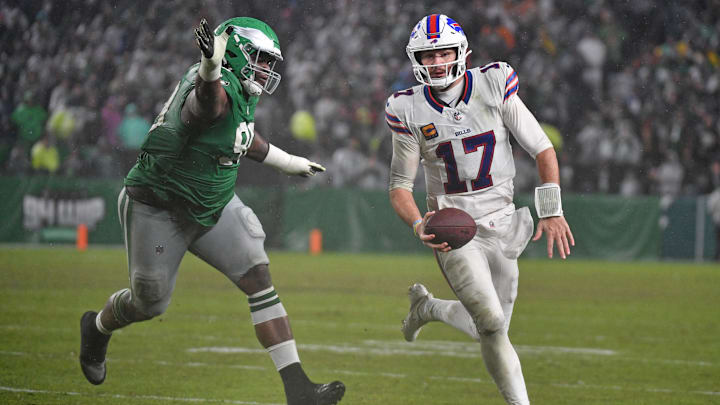 Buffalo Bills' quarterback Josh Allen (17) and Philadelphia Eagles' defensive tackle Jordan Davis (90).