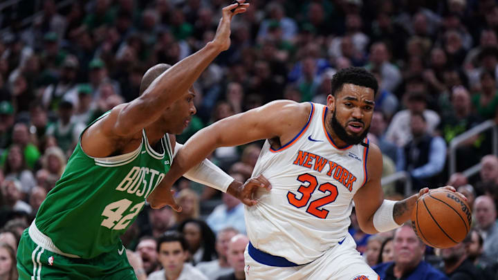 May 7, 2025; Boston, Massachusetts, USA; New York Knicks center Karl-Anthony Towns (32) drives the ball against Boston Celtics center Al Horford (42) in the second quarter during game two of the second round for the 2025 NBA Playoffs at TD Garden. Mandatory Credit: David Butler II-Imagn Images