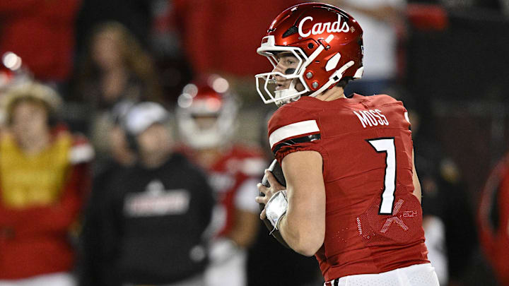 Louisville Cardinals quarterback Miller Moss (7) looks to pass against the California Golden Bears during the first quarter at L&N Federal Credit Union Stadium. Mandatory Credit: Jamie Rhodes-Imagn Images