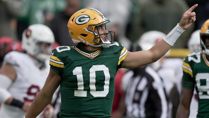 Green Bay Packers quarterback Jordan Love (10) signals first down during the fourth quarter of their game Sunday, October 13, 2024 at Lambeau Field in Green Bay, Wisconsin. The Green Bay Packers beat the Arizona Cardinals 34-13.