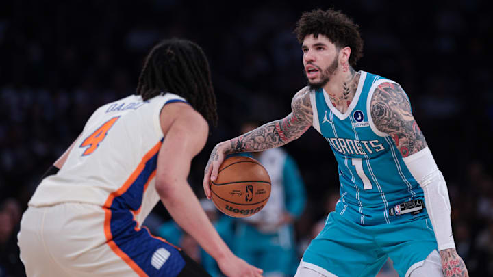 Apr 12, 2026; New York, New York, USA; Charlotte Hornets guard LaMelo Ball (1) dribbles as New York Knicks forward Pacome Dadiet (4) defends during the first half at Madison Square Garden. Mandatory Credit: Vincent Carchietta-Imagn Images Apr 12, 2026; New York, New York, USA; Charlotte Hornets guard LaMelo Ball (1) dribbles as New York Knicks forward Pacome Dadiet (4) defends during the first half at Madison Square Garden. Mandatory Credit: Vincent Carchietta-Imagn Images
