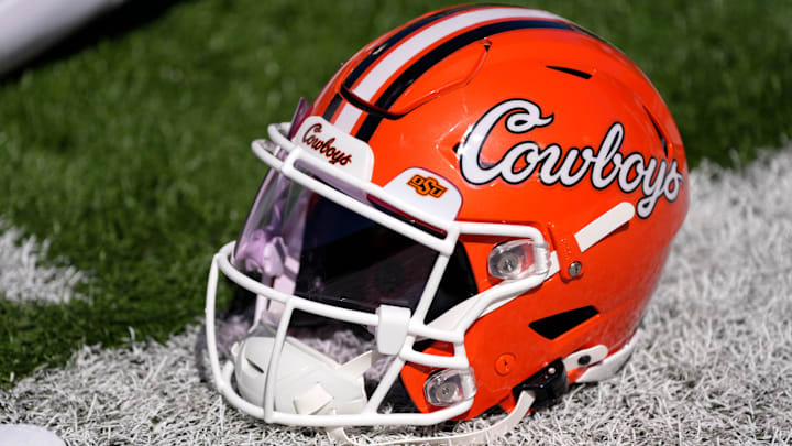 An Oklahoma State helmet is pictured before a college football game between the Oklahoma State Cowboys (OSU) and the West Virginia Mountaineers at Boone Pickens Stadium in Stillwater, Okla., Saturday, Oct. 5, 2024.