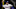 Texas Rangers starting pitcher Nathan Eovaldi in a white jersey with Rangers in blue script across front and a blue hat Texas Rangers starting pitcher Nathan Eovaldi in a white jersey with Rangers in blue script across front and a blue hat