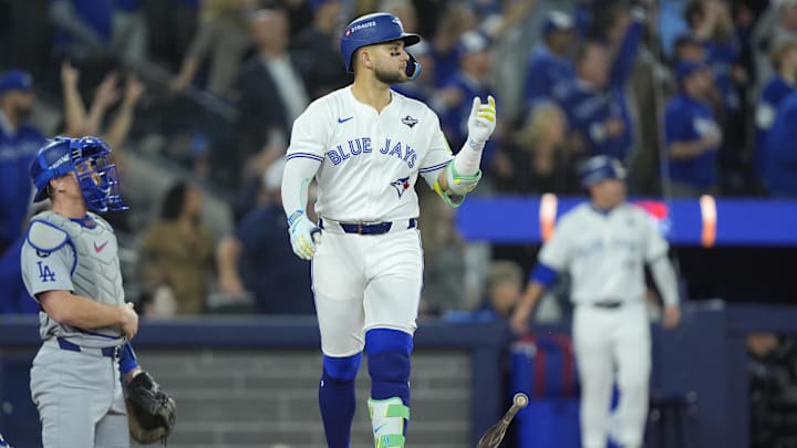 Nov 1, 2025; Toronto, Ontario, CAN; Toronto Blue Jays designated hitter Bo Bichette (11) reacts after hitting a three run home run against the Los Angeles Dodgers in the third inning during game seven of the 2025 MLB World Series at Rogers Centre. Mandatory Credit: John E. Sokolowski-Imagn Images