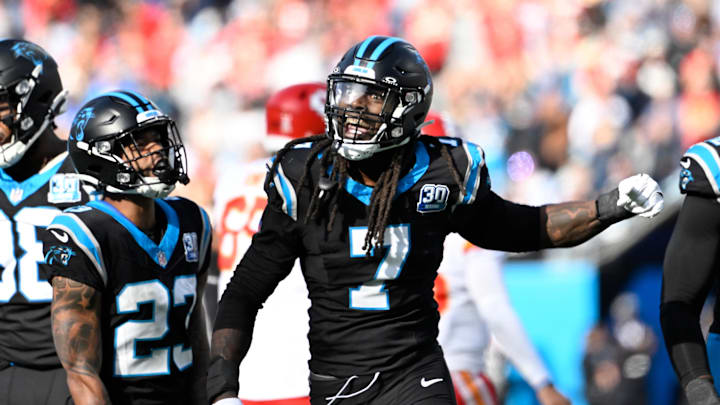 Nov 24, 2024; Charlotte, North Carolina, USA; Carolina Panthers linebacker Jadeveon Clowney (7) reacts after a sack in the second quarter at Bank of America Stadium. Mandatory Credit: Bob Donnan-Imagn Images