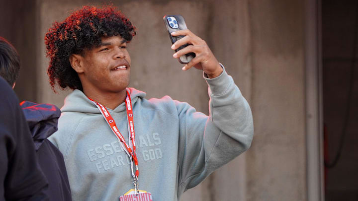 Recruit Jonah Williams watches Ohio State warm up before playing Penn State Oct. 21, 2023 at Ohio Stadium.