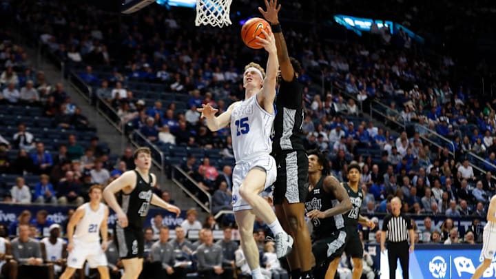 Richie Saunders attacks the rim against Cincinnati