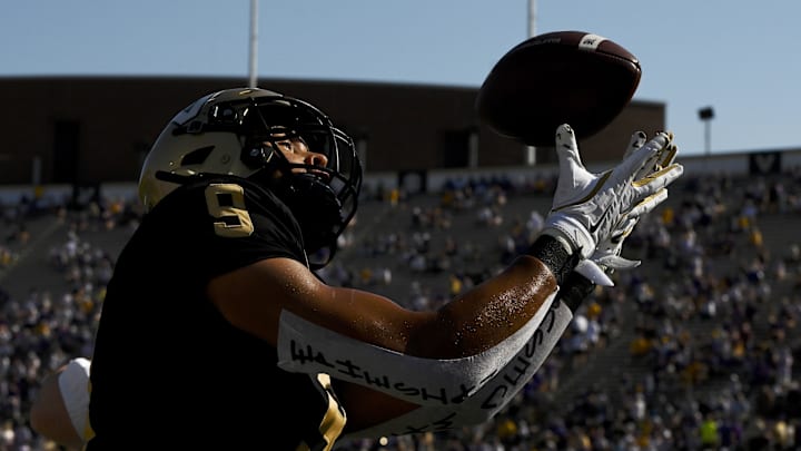 Oct 18, 2025; Nashville, Tennessee, USA;  Vanderbilt Commodores tight end Eli Stowers (9) makes a catch against the Louisiana State Tigers during pre-game warmups at FirstBank Stadium. Mandatory Credit: Steve Roberts-Imagn Images