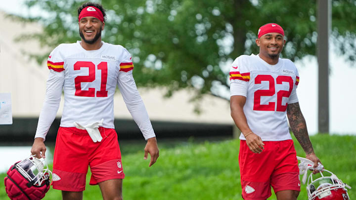 Jul 22, 2025; St. Joseph, MO, USA; Kansas City Chiefs safety Jaden Hicks (21) and cornerback Trent McDuffie (22) walk down the hill to the practice fields during training camp at Missouri Western State University. Mandatory Credit: Denny Medley-Imagn Images