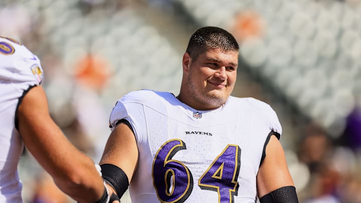 Oct 6, 2024; Cincinnati, Ohio, USA; Baltimore Ravens center Tyler Linderbaum (64) during warmups before the game against the Cincinnati Bengals at Paycor Stadium. Mandatory Credit: Katie Stratman-Imagn Images
