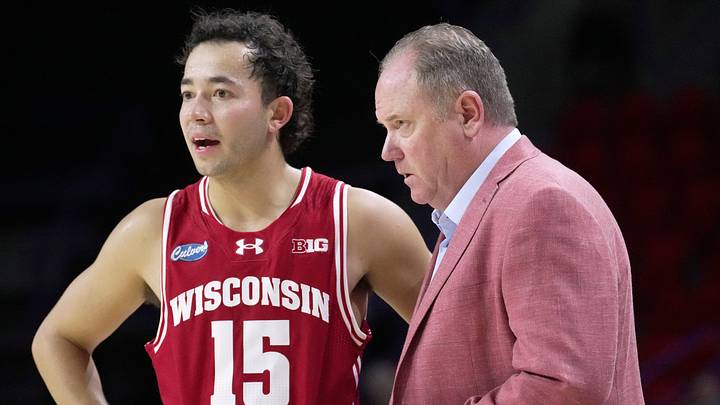 Wisconsin head coach Greg Gard talks with point guard Owen Foxwell. Wisconsin head coach Greg Gard talks with point guard Owen Foxwell.