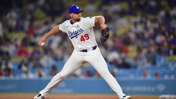 Sep 15, 2025; Los Angeles, California, USA; Los Angeles Dodgers pitcher Blake Treinen (49) throws against the Philadelphia Phillies during the tenth inning at Dodger Stadium. Mandatory Credit: Gary A. Vasquez-Imagn Images Sep 15, 2025; Los Angeles, California, USA; Los Angeles Dodgers pitcher Blake Treinen (49) throws against the Philadelphia Phillies during the tenth inning at Dodger Stadium. Mandatory Credit: Gary A. Vasquez-Imagn Images