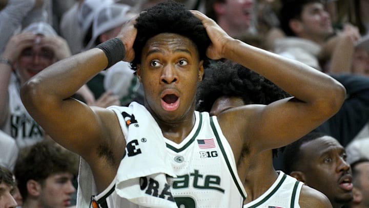 Jan 24, 2026; East Lansing, Michigan, USA;  Michigan State Spartans forward Cameron Ward (3) reacts from the bench to a Michigan State Spartans forward Coen Carr (55) dunk during the second half against the Maryland Terrapins at Jack Breslin Student Events Center. Mandatory Credit: Dale Young-Imagn Images