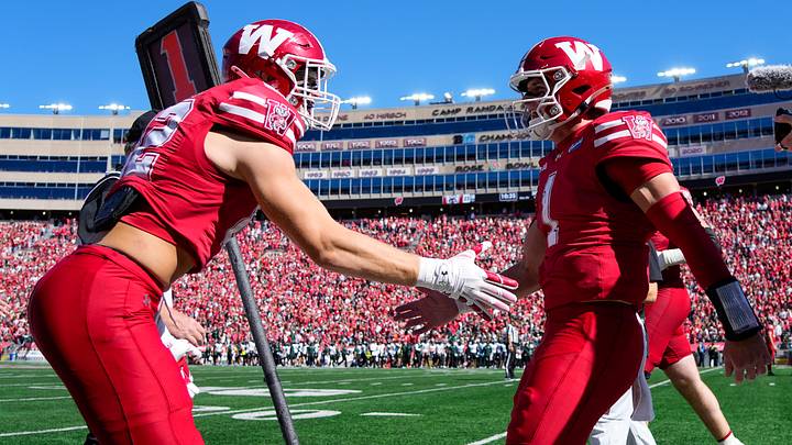 Oct 3, 2026; Madison, Wisconsin, USA;  Wisconsin Badgers quarterback Colton Joseph (1) celebrates with tight end Emmett Bork (82) after scoring a touchdown during the third quarter against the Michigan State Spartans at Camp Randall Stadium. Mandatory Credit: Jeff Hanisch-Imagn Images