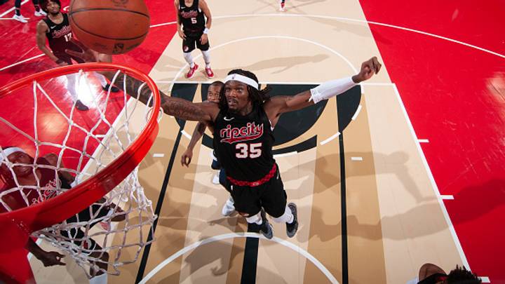 Robert Williams III skies for a rebound attempt during the Blazers' Play-In Tournament Game.