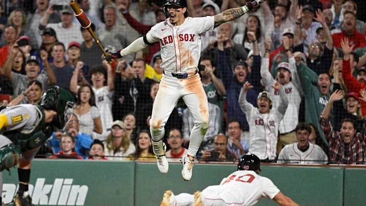 Sep 17, 2025; Boston, Massachusetts, USA; Boston Red Sox left fielder Jarren Duran (16) reacts as third baseman Nate Eaton (40) slides home to score the winning run against Athletics catcher Shea Langeliers (23) during the tenth inning at Fenway Park. Mandatory Credit: Eric Canha-Imagn Images Sep 17, 2025; Boston, Massachusetts, USA; Boston Red Sox left fielder Jarren Duran (16) reacts as third baseman Nate Eaton (40) slides home to score the winning run against Athletics catcher Shea Langeliers (23) during the tenth inning at Fenway Park. Mandatory Credit: Eric Canha-Imagn Images