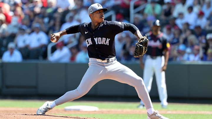 Mar 2, 2025; North Port, Florida, USA;  New York Yankees starting pitcher Marcus Stroman (0) throws a pitch during the first inning against the Atlanta Braves at CoolToday Park. 