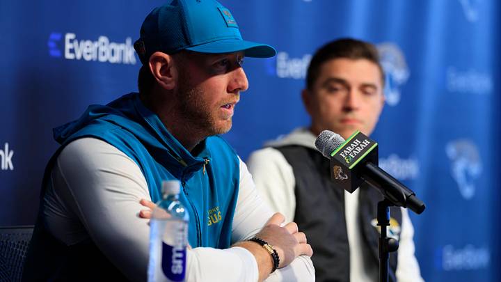 Jacksonville Jaguars head coach Liam Coen speaks during a press conference as general manager James Gladstone looks on at the Miller Electric Center, Wednesday, Jan. 14, 2026, in Jacksonville, Fla. Jacksonville Jaguars head coach Liam Coen speaks during a press conference as general manager James Gladstone looks on at the Miller Electric Center, Wednesday, Jan. 14, 2026, in Jacksonville, Fla.