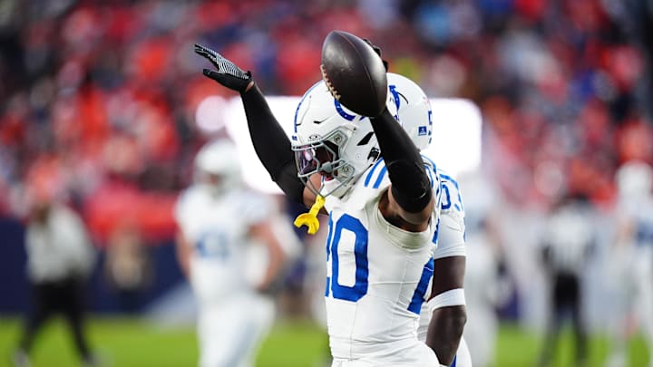 Dec 15, 2024; Denver, Colorado, USA; Indianapolis Colts safety Nick Cross (20) celebrates his interception in the second half against the Denver Broncos at Empower Field at Mile High. Mandatory Credit: Ron Chenoy-Imagn Images Dec 15, 2024; Denver, Colorado, USA; Indianapolis Colts safety Nick Cross (20) celebrates his interception in the second half against the Denver Broncos at Empower Field at Mile High. Mandatory Credit: Ron Chenoy-Imagn Images