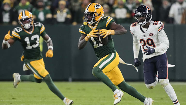 Jayden Reed catches a pass in front of Tyrique Stevenson in last year's Green Bay win at Lambeau Field. Jayden Reed catches a pass in front of Tyrique Stevenson in last year's Green Bay win at Lambeau Field.