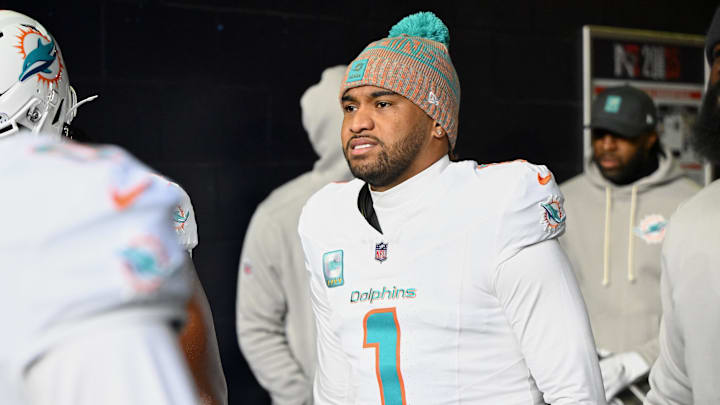 Miami Dolphins quarterback Tua Tagovailoa (1) walks out of the player tunnel before the game against the New England Patriots at Gillette Stadium in the 2025 season finale.